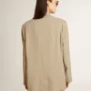 Beigefarbene Damenjacke mit Nadelstreifen und einreihiger Knopfleiste in Oversize-Passform