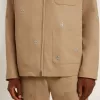 Beigefarbene Herrenjacke mit Blumenstickerei und durchgehendem Reißverschluss Beigefarbene Herrenjacke mit Blumenstickerei und durchgehendem Reißverschluss