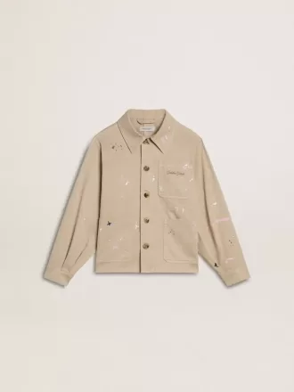 Beigefarbene Kinderjacke mit bunten Sprenkeln