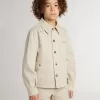 Beigefarbene Kinderjacke mit bunten Sprenkeln