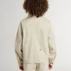 Beigefarbene Kinderjacke mit bunten Sprenkeln
