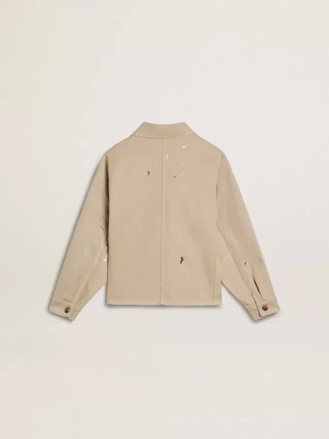 Beigefarbene Kinderjacke mit bunten Sprenkeln