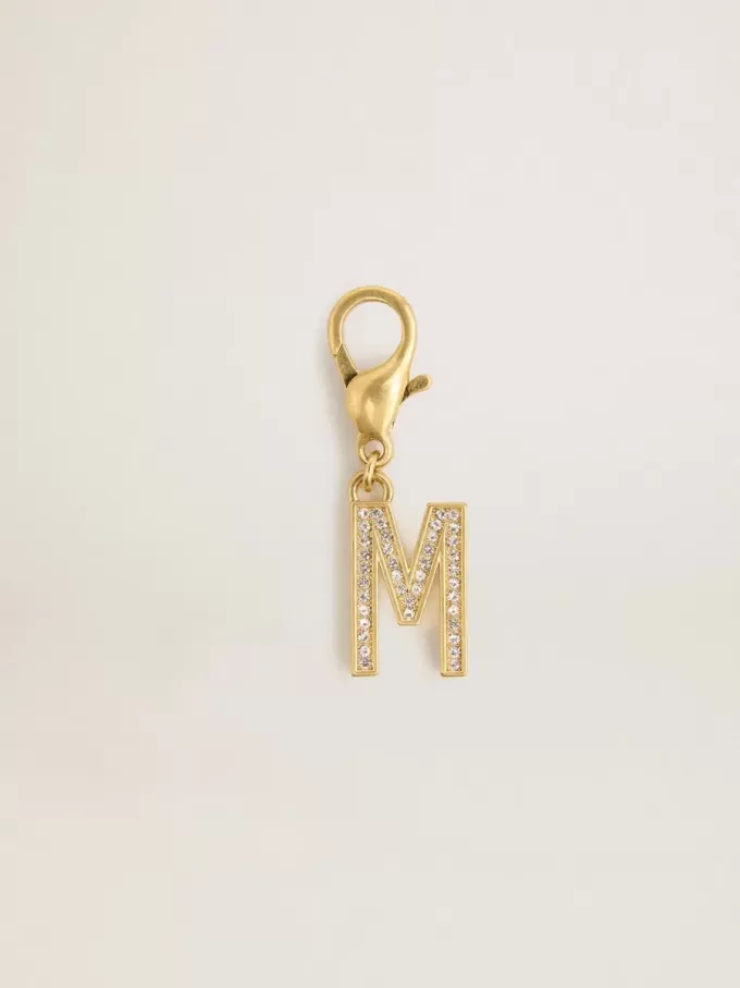 Buchstabe M-Anhänger aus goldfarbenem Messing mit Kristallen Buchstabe M-Anhänger aus goldfarbenem Messing mit Kristallen