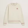 CNY-Sweatshirt aus abgenutzter weißer Baumwolle mit roter Stickerei CNY-Sweatshirt aus abgenutzter weißer Baumwolle mit roter Stickerei