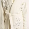 Cremefarbene Damenstrickjacke aus Baumwolle mit Blumenstickerei