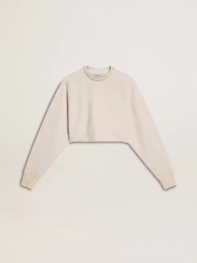 Cremefarbenes, kurz geschnittenes Sweatshirt für Damen aus Baumwolle mit Kristallen auf der Vorderseite