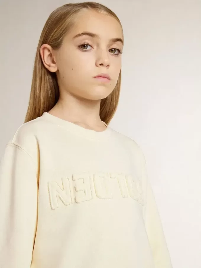 Cremefarbenes Sweatshirt für Mädchen mit Aufnäher-Schriftzug Cremefarbenes Sweatshirt für Mädchen mit Aufnäher-Schriftzug