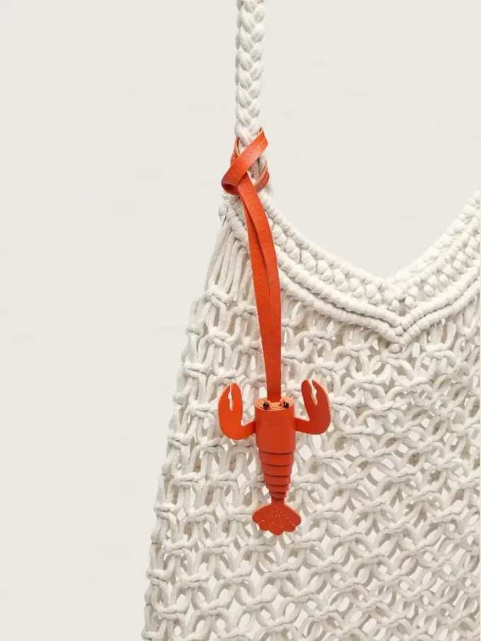 Damen-Makramee-Tasche aus butterfarbener Baumwolle mit Leder-Hummer-Anhänger