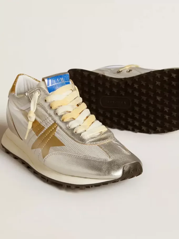 Damen-Marathon mit silbernem Ripstop-Nylon-Obermaterial und goldenem Stern
