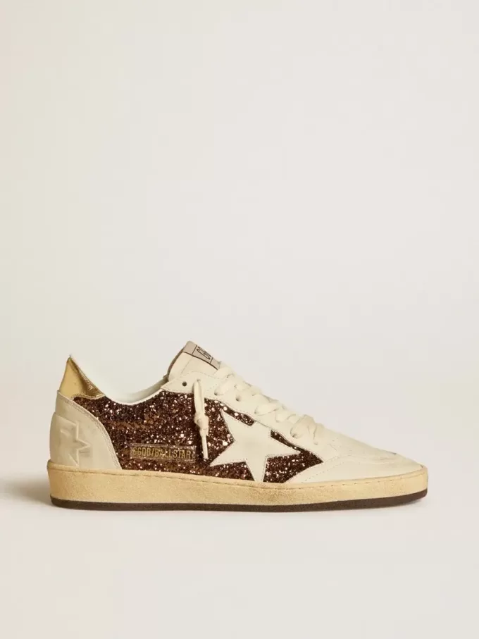 Damen-Sneaker „Ball Star” in Glitzeroptik mit Lederstern und metallischer Lederlasche am Fersenbereich Damen-Sneaker „Ball Star” in Glitzeroptik mit Lederstern und metallischer Lederlasche am Fersenbereich