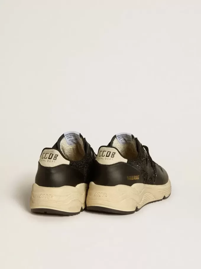 Damen-Sneaker „Running Sole” in Schwarz mit Glitzer, Lederstern und Fersenlasche aus Nubukleder