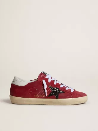Damen-Super-Star aus rotem Wildleder mit Glitzerstern und weißer Fersenlasche Damen-Super-Star aus rotem Wildleder mit Glitzerstern und weißer Fersenlasche