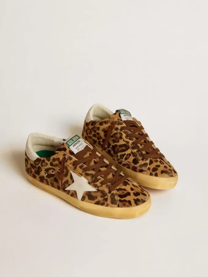 Damen-Super-Star LTD aus Ponyfell mit Leopardenmuster, Lederstern und Fersenlasche Damen-Super-Star LTD aus Ponyfell mit Leopardenmuster, Lederstern und Fersenlasche