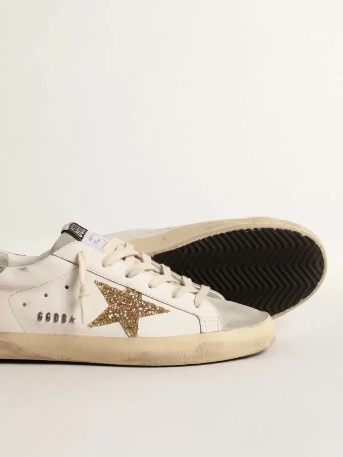 Damen-Super-Star mit goldenem Glitzerstern und eisgrauen Wildledereinsätzen Damen-Super-Star mit goldenem Glitzerstern und eisgrauen Wildledereinsätzen
