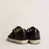 Damen-Superstar aus schwarzem Nappa und Glitzer mit glänzendem schwarzen Lederstern Damen-Superstar aus schwarzem Nappa und Glitzer mit glänzendem schwarzen Lederstern