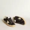 Damen-Superstar in schwarzem Glitzer und Nappa mit cremefarbenem Lederstern und Fersenlasche Damen-Superstar in schwarzem Glitzer und Nappa mit cremefarbenem Lederstern und Fersenlasche
