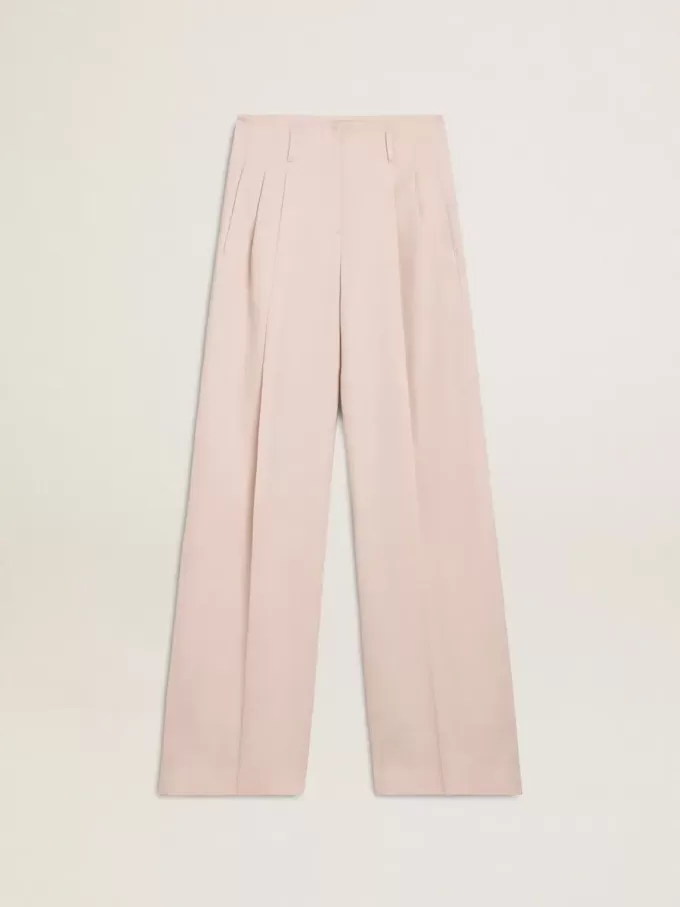 Damenhose aus rosa, maßgeschneidertem Wollstoff Damenhose aus rosa, maßgeschneidertem Wollstoff