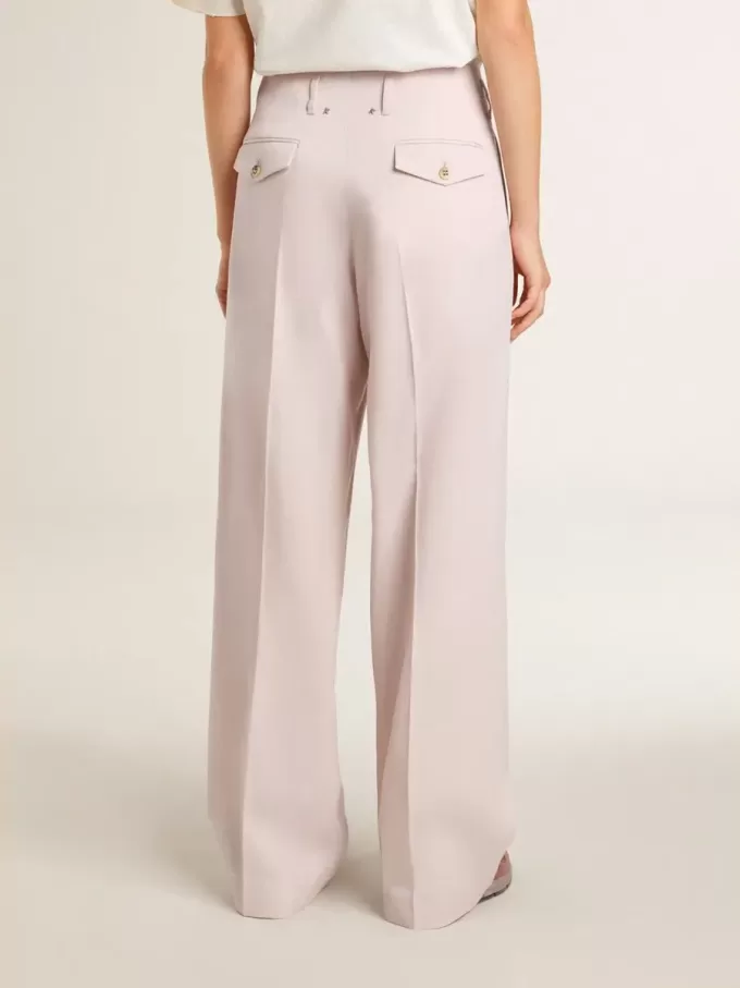 Damenhose aus rosa, maßgeschneidertem Wollstoff Damenhose aus rosa, maßgeschneidertem Wollstoff