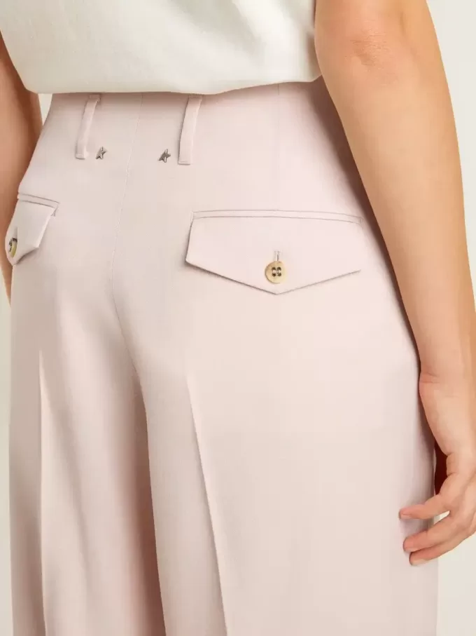 Damenhose aus rosa, maßgeschneidertem Wollstoff Damenhose aus rosa, maßgeschneidertem Wollstoff