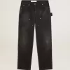 Damenjeans aus schwarzem Baumwollstoff im Distressed-Look mit Patches auf der Vorderseite