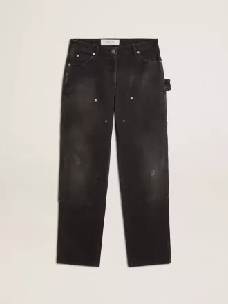 Damenjeans aus schwarzem Baumwollstoff im Distressed-Look mit Patches auf der Vorderseite