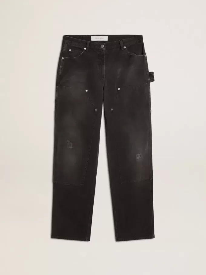 Damenjeans aus schwarzem Baumwollstoff im Distressed-Look mit Patches auf der Vorderseite