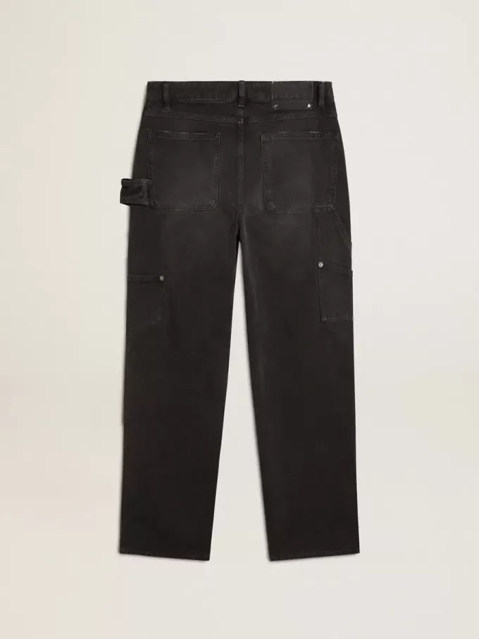 Damenjeans aus schwarzem Baumwollstoff im Distressed-Look mit Patches auf der Vorderseite