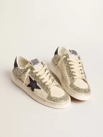 Damenmodell Stardan in Platin-Glitzer mit dunkelblauem Wildlederstern und Fersenlasche