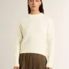 Damenpullover mit Rundhalsausschnitt aus weißer Merinowolle mit Kristallen Damenpullover mit Rundhalsausschnitt aus weißer Merinowolle mit Kristallen