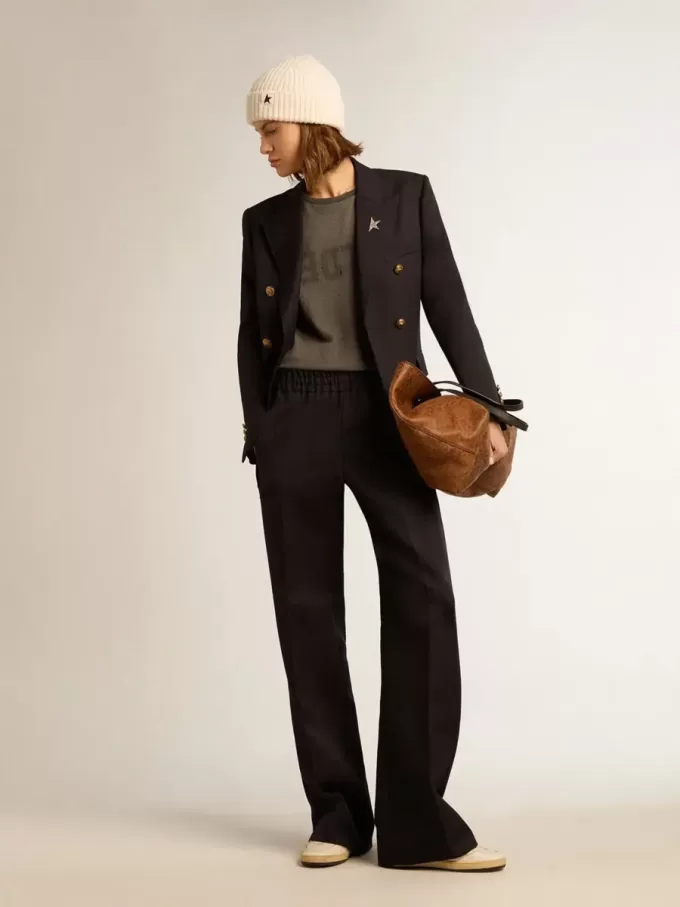 Dunkelblauer Damenblazer mit doppelter Knopfleiste Dunkelblauer Damenblazer mit doppelter Knopfleiste