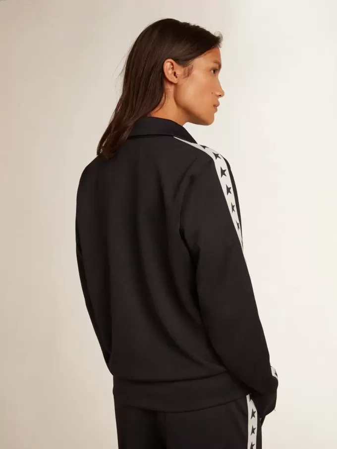 Dunkelblaues Sweatshirt mit Reißverschluss, weißem Streifen und kontrastierenden Sternen