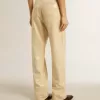 Ecrufarbene Hose mit transparenten Pailletten