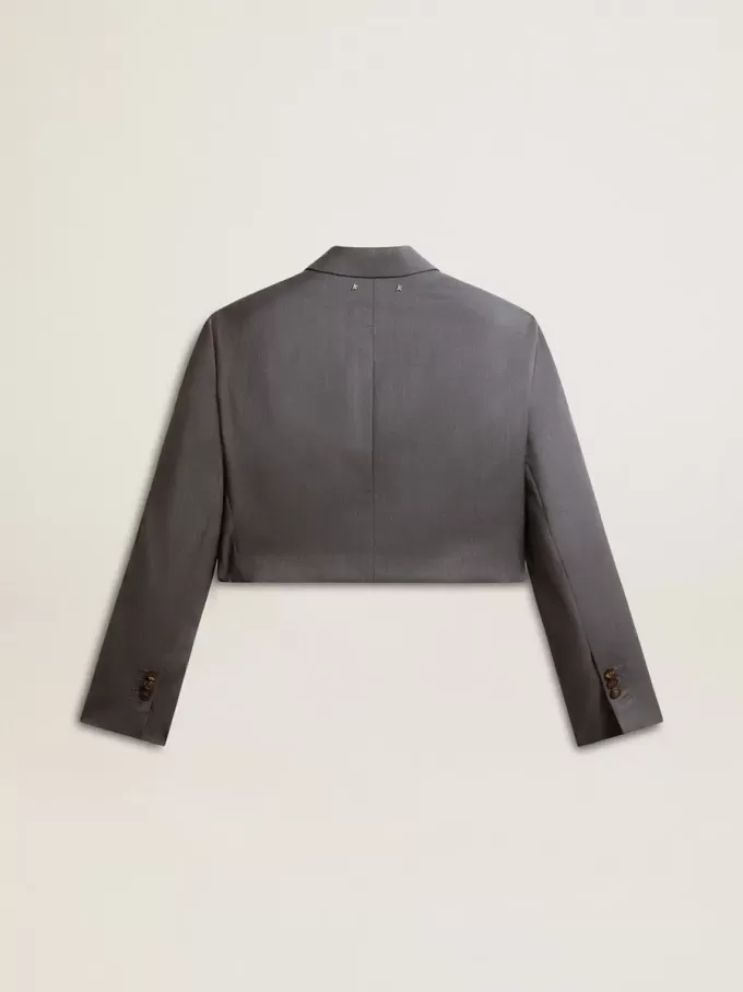 Einreihige, verkürzte Damenjacke aus babyblauer Wolle Einreihige, verkürzte Damenjacke aus babyblauer Wolle