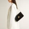 Gioia Tasche aus schwarzem Leder mit Golddetails