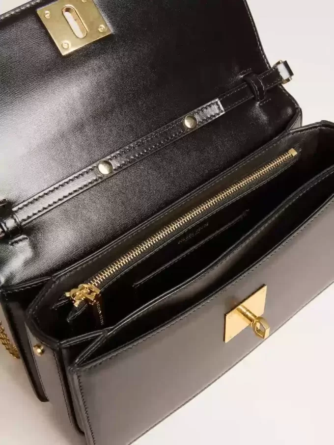 Gioia Tasche aus schwarzem Leder mit Golddetails