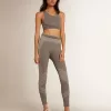 Grau melierte Damen-Leggings mit gemischten Nähten Grau melierte Damen-Leggings mit gemischten Nähten