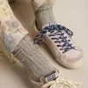 Graue Socken mit Kristallen am Schaft Graue Socken mit Kristallen am Schaft