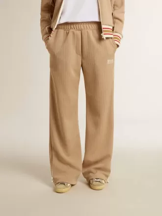 Hellbeige Jogginghose für Damen mit weißem Logo
