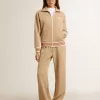 Hellbeige Jogginghose für Damen mit weißem Logo