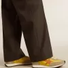 Herren-Marathon mit gelbem Nylon-Obermaterial und orangefarbenem Stern
