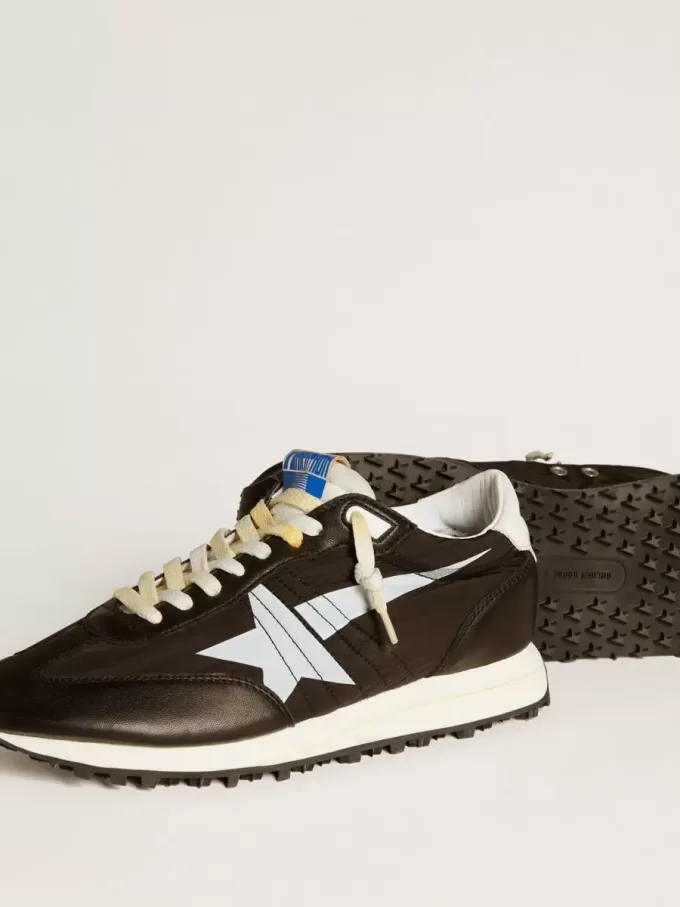 Herren-Marathon mit schwarzem Nylon-Obermaterial und weißem Stern