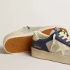 Herren-Sneaker Stardan aus grauem und blauem Leder mit cremefarbenem Stern und Fersenlasche