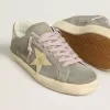 Herren-Super-Star aus grauem Wildleder mit goldfarbenem Metallstern und Fersenlasche