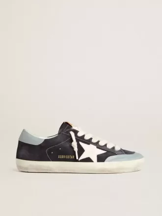 Herren-Super-Star aus mitternachtsblauem Wildleder mit weißem Lederstern und hellblauem Lederabsatz Herren-Super-Star aus mitternachtsblauem Wildleder mit weißem Lederstern und hellblauem Lederabsatz