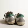 Herren-Super-Star aus weißem Leder mit silbernem Stern und grüner Fersenlasche Herren-Super-Star aus weißem Leder mit silbernem Stern und grüner Fersenlasche