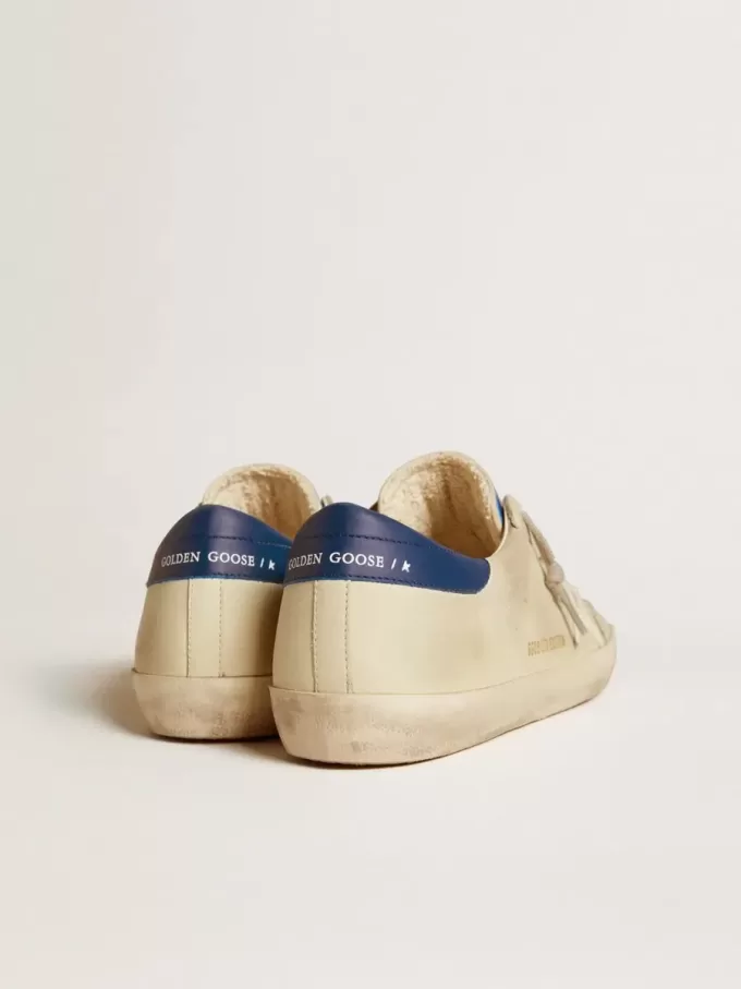 Herren-Super-Star LTD aus Nubukleder mit weißem Lederstern und blauer Fersenlasche
