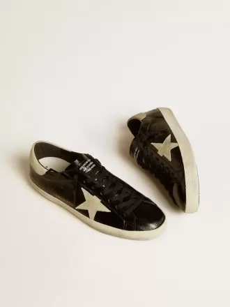 Herren-Super-Star LTD aus schwarzem Lackleder mit Stern und Fersenlasche aus Wildleder