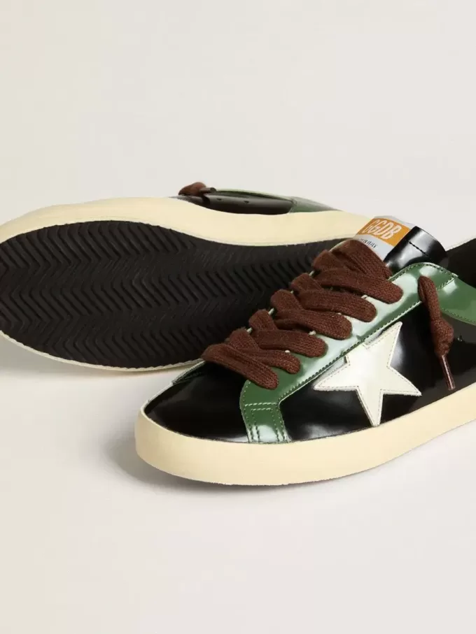 Herren-Super-Star LTD aus schwarzem laminiertem Leder mit weißem Lederstern und Fersenlasche Herren-Super-Star LTD aus schwarzem laminiertem Leder mit weißem Lederstern und Fersenlasche