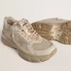 Herrenmodell Lightstar aus taubengrauem Leder und Mesh mit beigem TPU-Stern