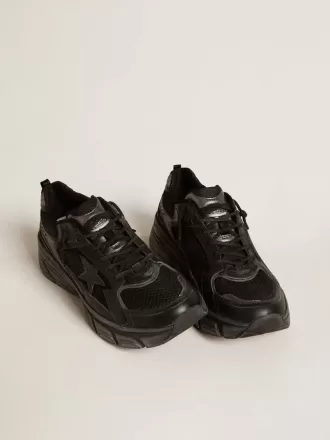 Herrenmodell Lightstar mit schwarzem Obermaterial aus Leder und Mesh und schwarzem Stern